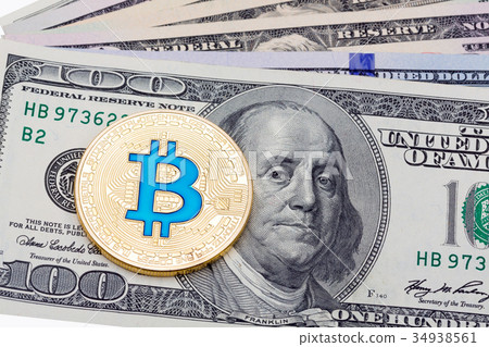A few hundred dollar banknotes with golden A few hundred dollar banknotes with golden 34938561