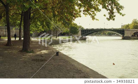 The Seine river embankment in Paris in autumn The Seine river embankment in Paris in autumn 34938821