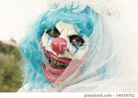 scary evil clown in a bride dress 34939782