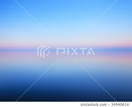 Minimalist landscape of calm water and horizon 34940614