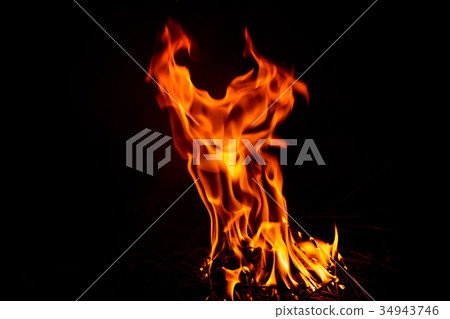 fire flame on dark background. 34943746