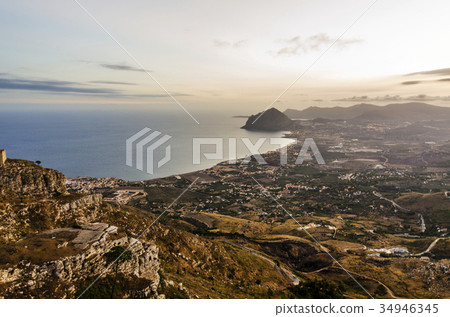 Sicilian coast and cofano mountain seen from erice Sicilian coast and cofano mountain seen from erice 34946345