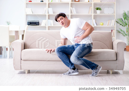 Man suffering from sick stomach and vomiting 34949705