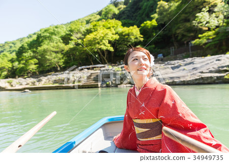 Woman in kimono boat 34949735