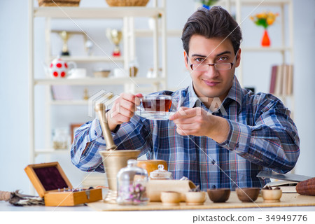 Professional tea expert trying new brews Professional tea expert trying new brews 34949776