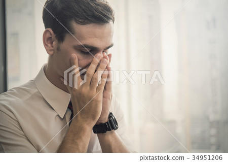 Portrait stressed sad business man 34951206
