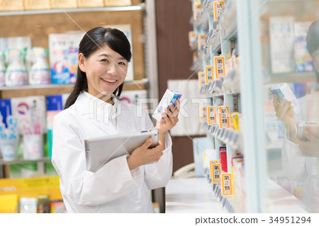 Pharmacist pharmacy drugstore medical image 34951294
