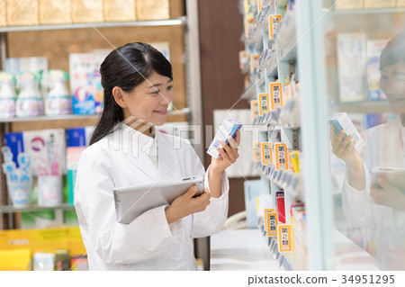 Pharmacist pharmacy drugstore medical image 34951295