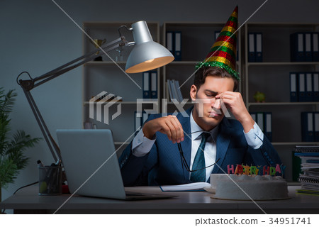 Man celebrating birthday in the office 34951741