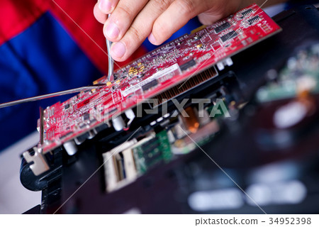 Repairman working in technical support fixing 34952398