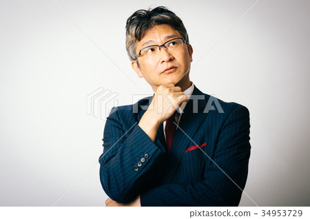 Businessman thinking Businessman thinking 34953729
