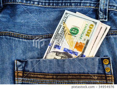 Money in the pocket of jeans trousers Money in the pocket of jeans trousers 34954976