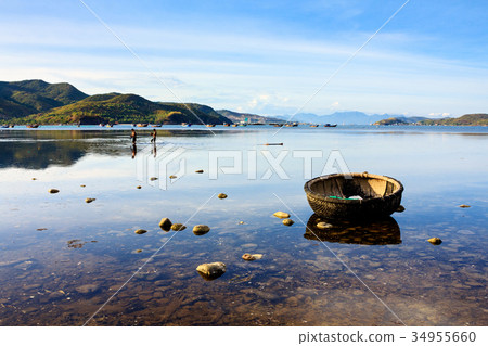 Basket boats at a lagoon in Song Lo, Phuoc Dong 34955660