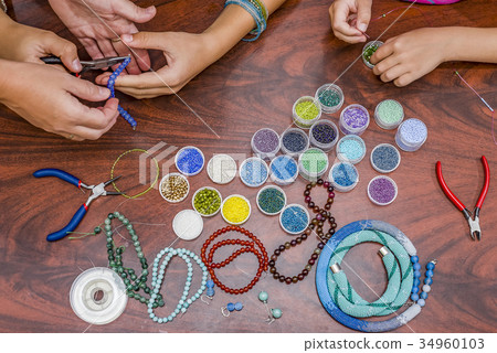 Making of handmade jewellery. Making of handmade jewellery. 34960103