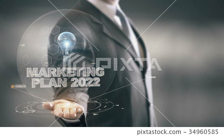 Marketing Plan 2022 with bulb hologram businessman 34960585