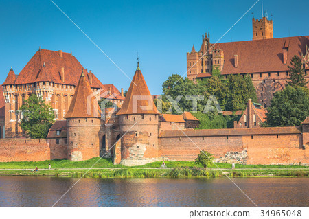 Malbork Castle at Nogat River in Poland, Europe Malbork Castle at Nogat River in Poland, Europe 34965048