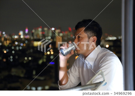 Male veranda beer night view Male veranda beer night view 34969296