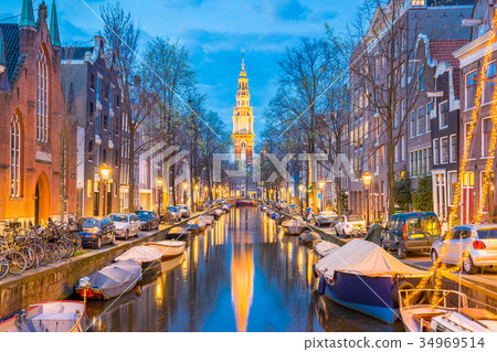 Dutch house style with the canal in Amsterdam city Dutch house style with the canal in Amsterdam city 34969514
