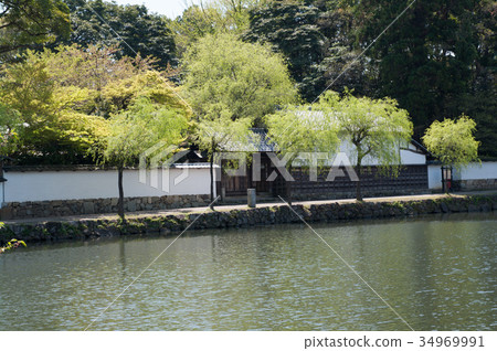 Buried wood house of Hikone castle outside moat 34969991