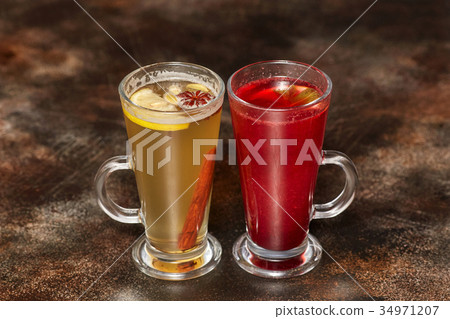 Compote with lemon and cinnamon and berry juice Compote with lemon and cinnamon and berry juice 34971207