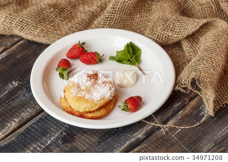 Breakfast with pancakes, strawberry, top view Breakfast with pancakes, strawberry, top view 34971208