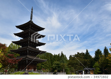 Blue sky and five towers 34971602
