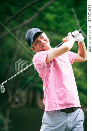 Middle men playing golf Middle men playing golf 34971651