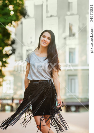 gorgeous girl walking around town 34973821