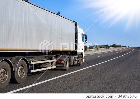Truck on road with container, cargo transportation Truck on road with container, cargo transportation 34975576