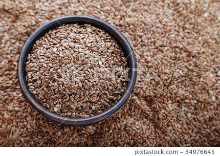 Flax seeds in a plate Flax seeds in a plate 34976645