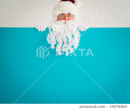 Santa Claus holding banner blank Santa Claus holding banner blank 34978864