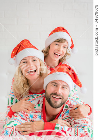 Happy family in Christmas eve 34979079