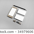 Stationery and cellphone 34979606