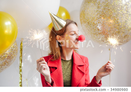 woman around at a party on background of balloon woman around at a party on background of balloon 34980980