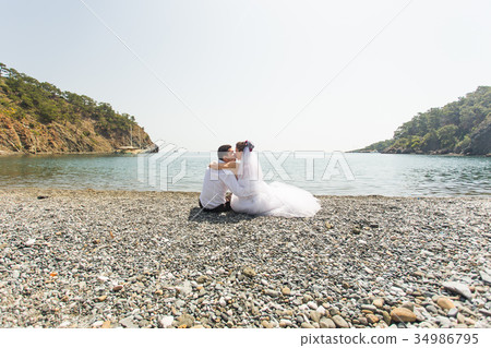 honeymoon couple travel sea and beach resort in 34986795