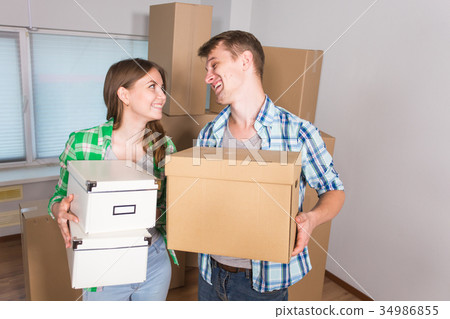 Young Couple Moving In To New Home Together 34986855