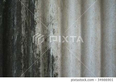 Old dirty corrugated roof tile textured 34986901