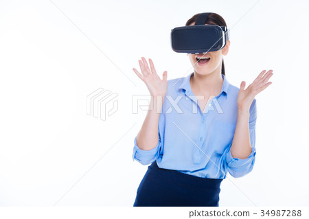 Positive young woman being excited about virtual Positive young woman being excited about virtual 34987288