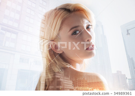 Cute girl looking at you with calmness in eyes Cute girl looking at you with calmness in eyes 34989361