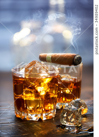 Whiskey and cigar 34989402