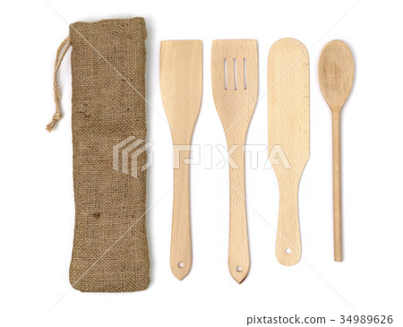 Wooden kitchen utensils isolated on white Wooden kitchen utensils isolated on white 34989626