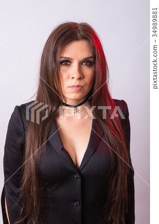 Fashion young woman going to Halloween party Fashion young woman going to Halloween party 34989881