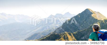 Man in background of picturesque landscape 34992730