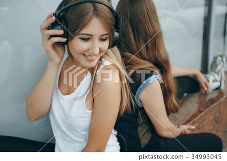 girls with headphone girls with headphone 34993045
