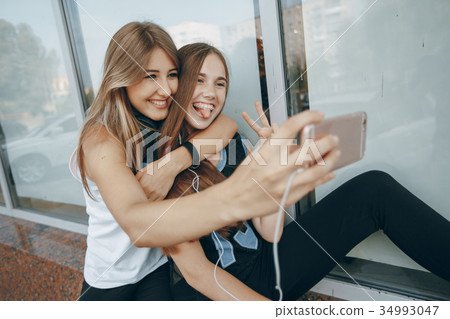 girls with headphone girls with headphone 34993047