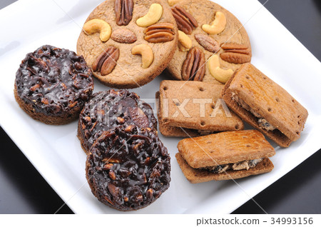 Assorted baked sweets Assorted baked sweets 34993156