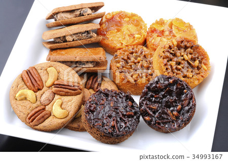 Assorted baked sweets Assorted baked sweets 34993167