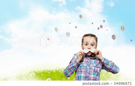 Kid having fun 34996871