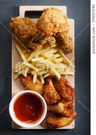 fried chicken legs. 34997046
