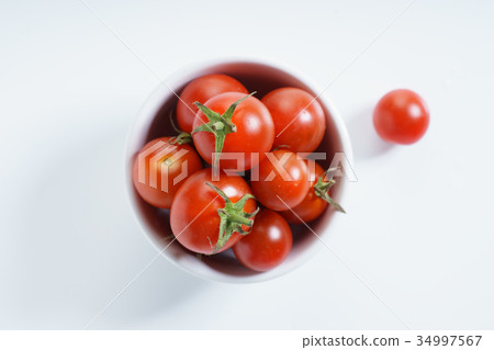 fresh tomatoes. 34997567